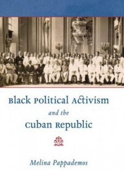 Book cover for "Black Political Activism and the Cuban Republic" by Melina Pappademos featuring a black and white photograph of a large group of formally dressed people sitting and standing in rows inside an ornate hall.