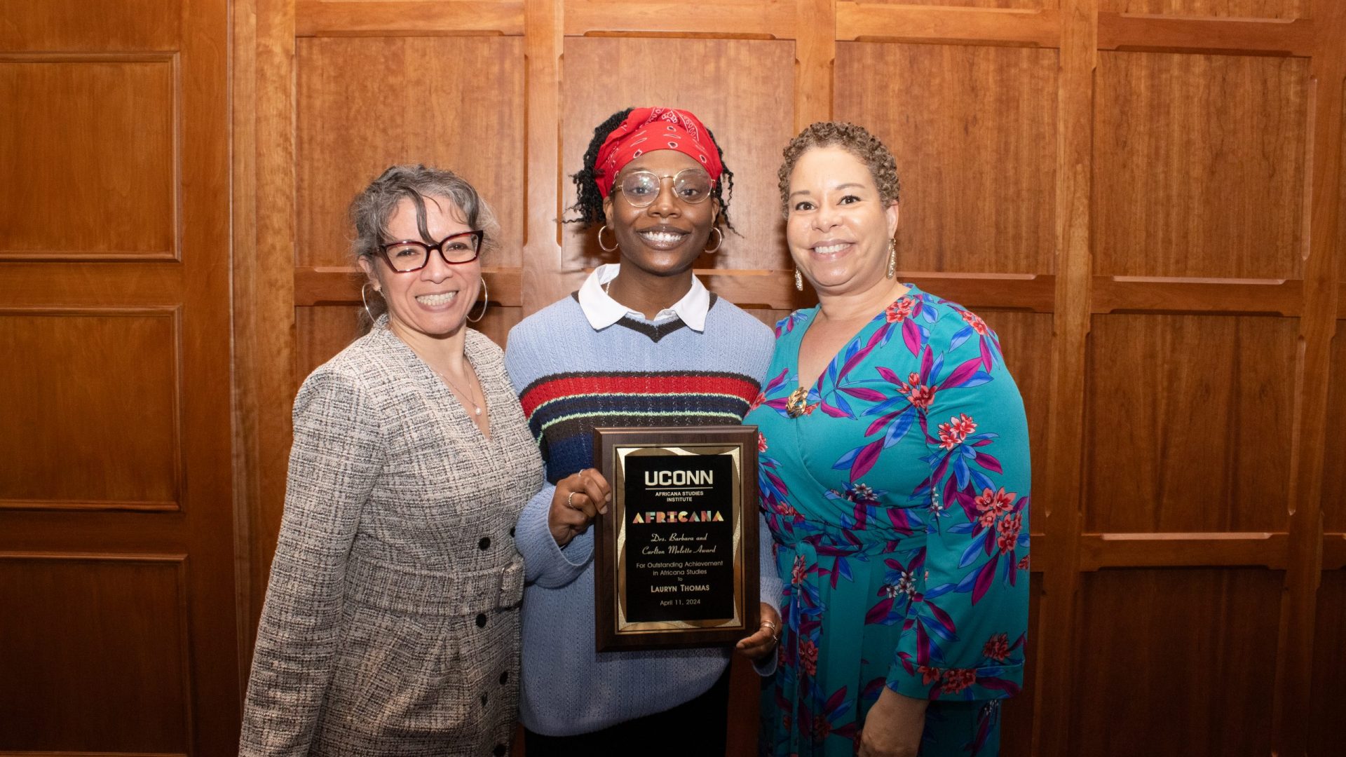 Photo of Evelyn Simien, recipient of the Molette Award, Lauryn Thomas holding her award, and Andrea Molette Branford