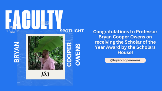 Faculty spotlight on a blue background featuring a man with a beard and a pink shirt holding a large leaf in a forest. Text congratulates him as Scholar of the Year.