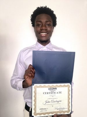 John Asobayire holding certificate