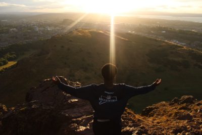 Man looking at nature unde the sum